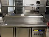 a stainless steel counter in a commercial kitchen