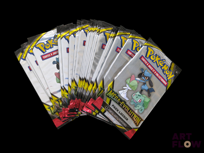 a lot of pokemon trading cards on a black background