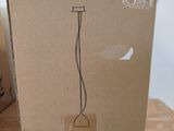 a box that has a broom on top of it