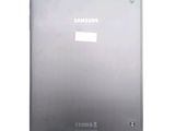 the back of a silver samsung tablet with a sticker on it
