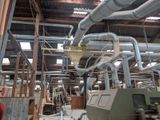a machine that is working on pipes in a building
