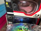 a box with a helmet and a pair of ski goggles on it
