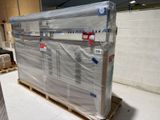 a pallet with a large box on it in a warehouse