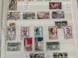 un livre avec beaucoup de timbres
