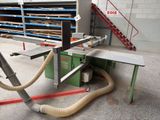 a machine that has a hose attached to it ' s side