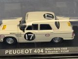 a model of a white car in a display case