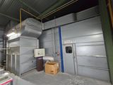 an image of a warehouse with a lot of equipment