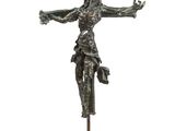 statue of a man on a cross on a marble base