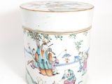 an image of a white container with a painting of people on it