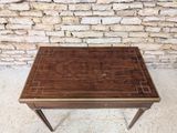 an image of a small table with a wooden top