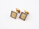 une paire de boutons de manchette en or et saphir bleu