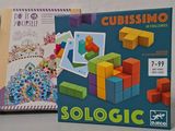 two books on the table and a toy bear on the table