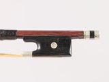 a violin bow with a wooden handle on a white background