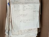 a cardboard box with a lot of papers inside of it