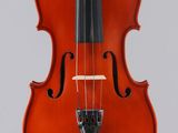 an orange violin with a black bow on a white background