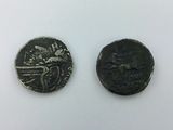 two ancient roman coins, one of which is a roman coin and the other of which is a roman coin