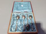 a box with spoons and spoon spoons in it