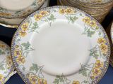 a lot of plates that are sitting on a table
