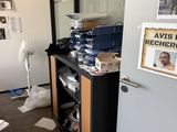 a picture of a room with a bunch of papers on the floor
