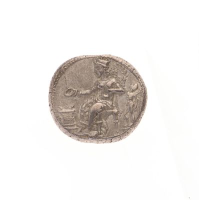 une image représentant une pièce d'argent sur laquelle figure un homme à cheval