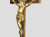 a statue of jesus on a cross on a white background