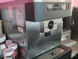 a coffee machine that is sitting on a counter