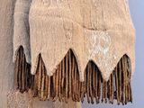 a piece of clothing that is hanging on a wall