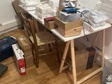 a table with a lot of boxes on it in a room