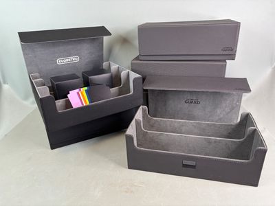 two boxes that are sitting next to each other on a table