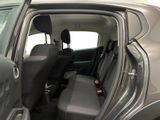 a car that has two seats in the back of it