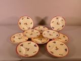 a pile of plates that are sitting on a table