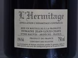 a label on a bottle of wine on a table