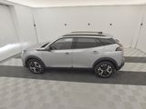 nissan kickstart in a garage with a checkered floor and white walls
