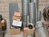 a room with a lot of boxes and a bunch of hoses