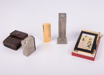 several different types of lighters and lighter cases on a white surface