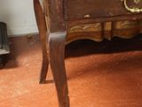 a small table with a mirror on top of it