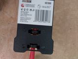 a yellow and red wire plug attached to a black and yellow wire