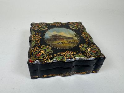 a black box with a picture of a castle on it