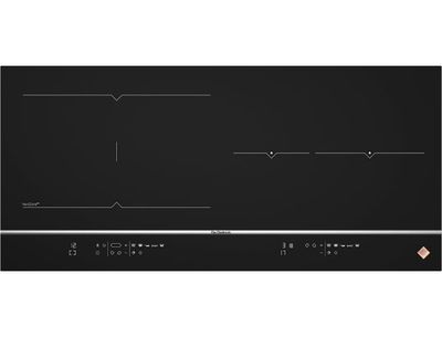 a black stove top with three burners and three burners