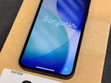a close up of a box with a phone on top of it