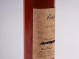 a bottle of alcohol that is sitting on a table