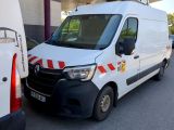 a white van that is parked in front of a gas station