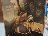 a room divider with a painting of birds on it