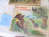trois livres pour enfants exposés sur une table
