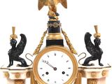 a clock that is sitting on top of a table