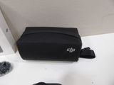 a black bag sitting on top of a table next to a microphone