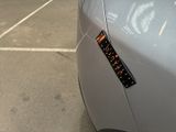 a sticker on the side of a car that says