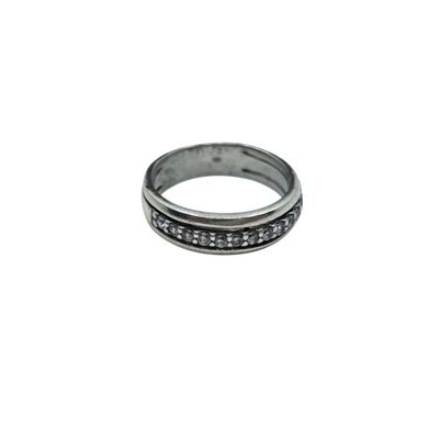 a close up of a ring with diamonds on a white background