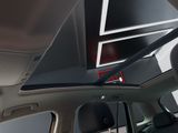 the interior of a car with the sunroof down and the sunroof down