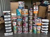 many cans of food stacked on top of each other